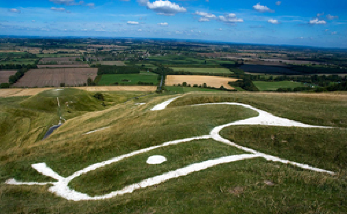 Uffington White Horse with view over vale.